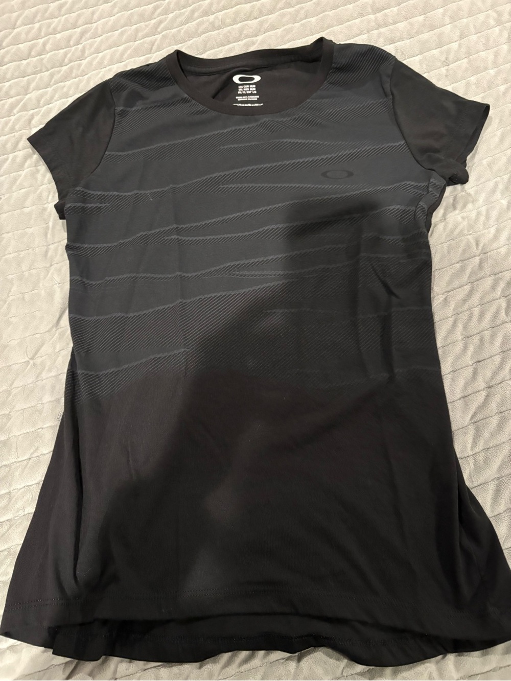 Oakley Black Short Sleeve Performance Tee with Subtle Stripe Texture